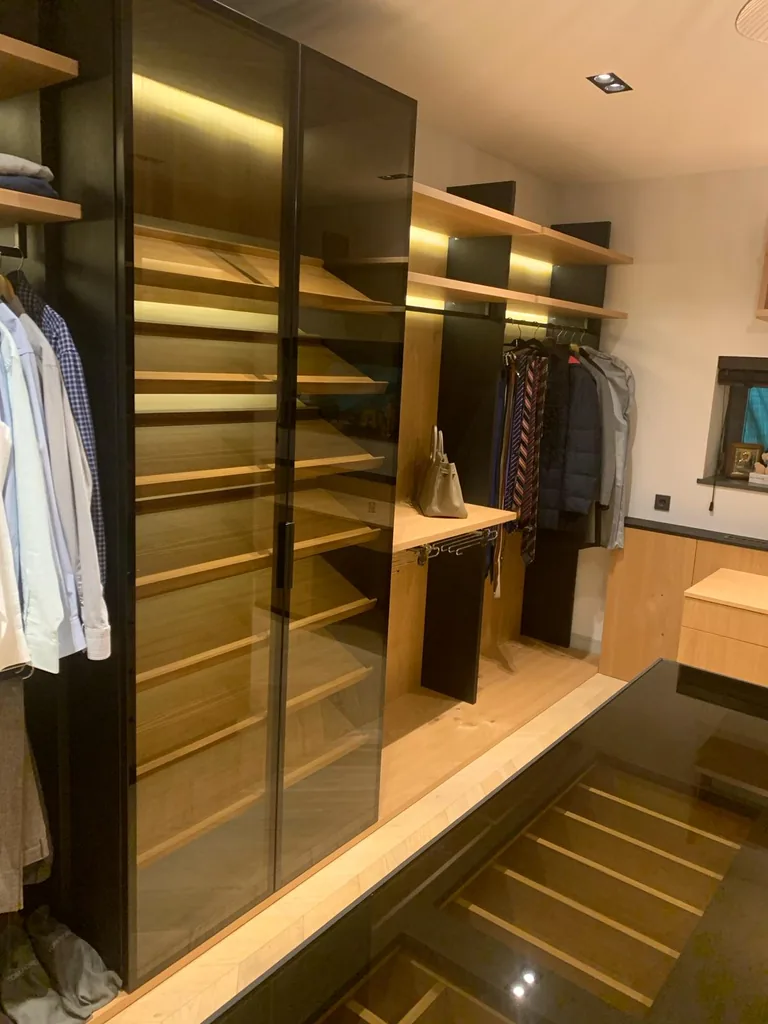 Turnkey custom furniture project in Walk In Closet Shelving Island Custom Furniture by RPGroup